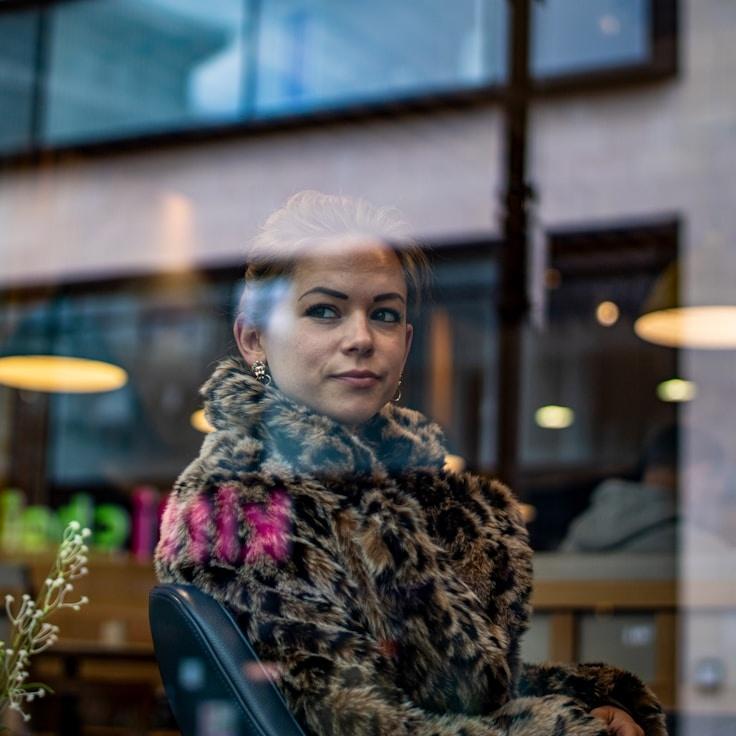 Dimitri Chen, Client Relations Director, discussing corporate gifting strategy with business clients